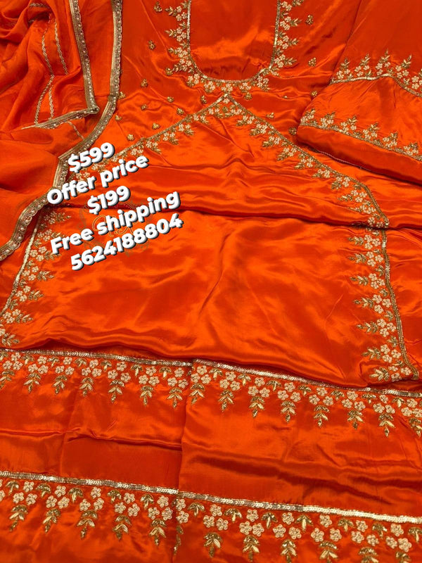 Orange Beautiful designer suit on pure crepe cut dana handwork